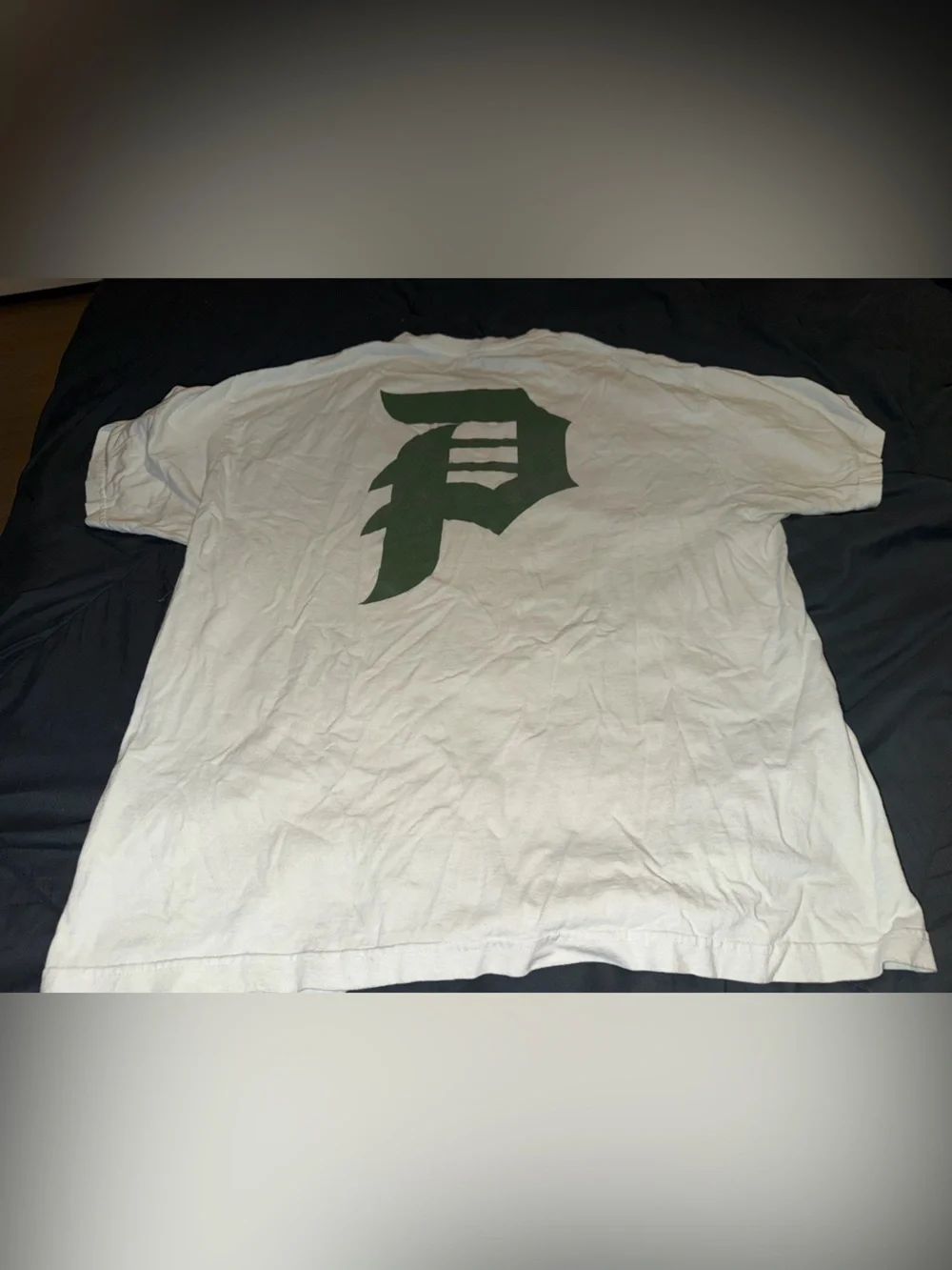 Primitive White Short Sleeve Tee with Green Chest Logo
